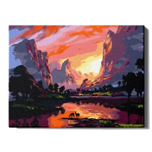 Auringonlasku vuorten keskellä