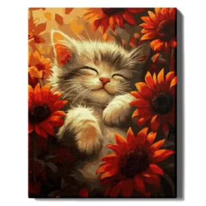 Kissanpentu kukkien keskellä